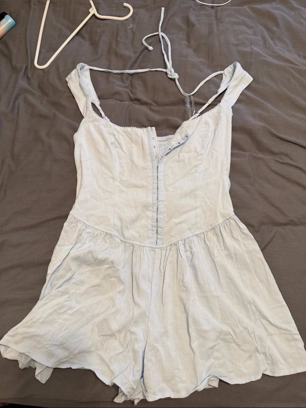Light blue romper with tags on